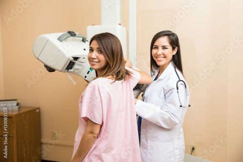 Cute patient getting a mammography test in a hospital