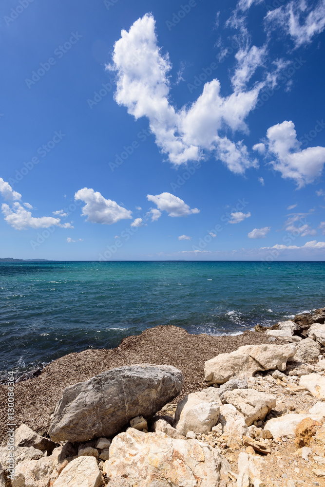 Beautiful and rocky beach near Acharawi village, Corfu, Greece.