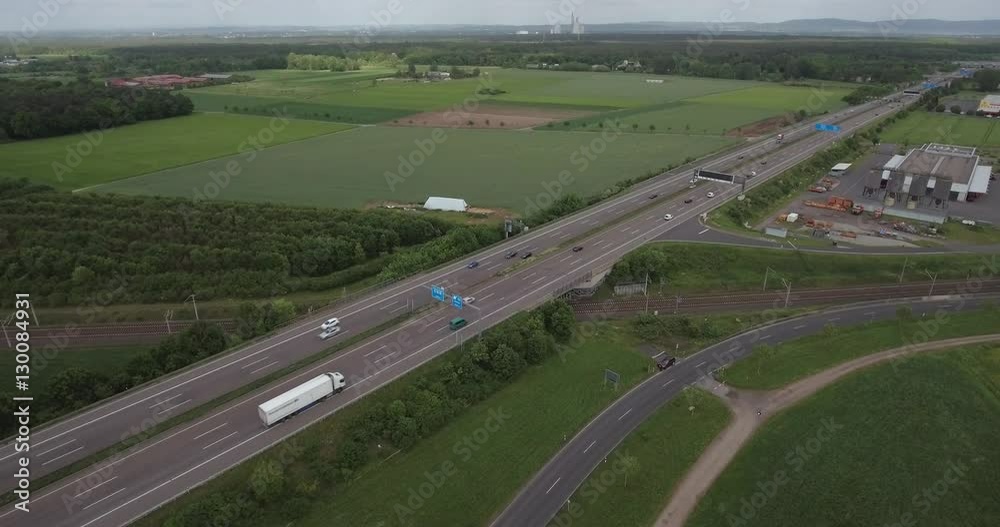 Highway west of Frankfurt, behind the skyline of Frankfurt and then the coal power plant Kahl am Main Highway west of Frankfurt, behind the skyline of Frankfurt and then the coal power plant Kahl am Main