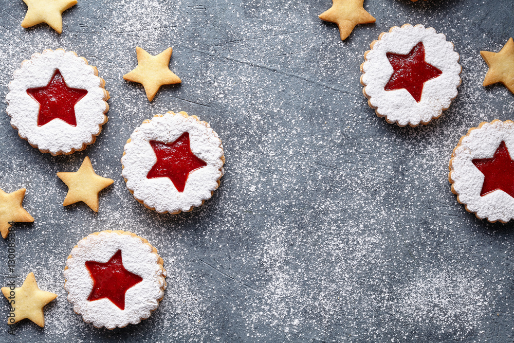 Linzer star cookies with jam filling decorations flat lay traditional winter Christmas homemade Austrian sweet dessert food Xmas celebration pastry holiday snack on vintage background. Linzer star cookies with jam filling decorations flat lay traditional winter Christmas homemade Austrian sweet dessert food Xmas celebration pastry holiday snack on vintage background.