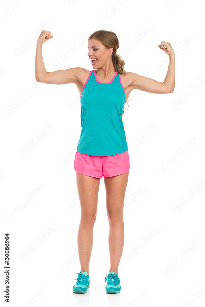 Shouting Woman In Sports Clothes Flexing Muscles Shouting Woman In Sports Clothes Flexing Muscles