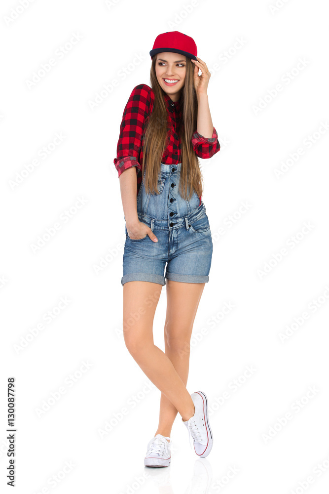 Happy Casual Woman Posing In Red Full Cap Happy Casual Woman Posing In Red Full Cap