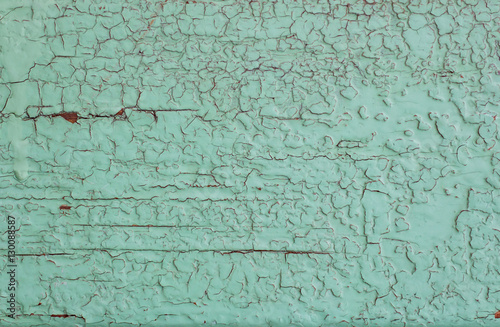 Green old painted cracky wooden background