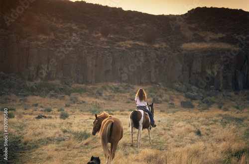 Woman riding horse, Odessa, Eastern Washington state photo