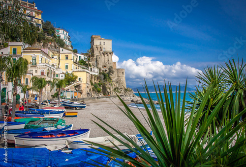 Sandy beach cove with colorful boats on Amalfi Coast, Cetara