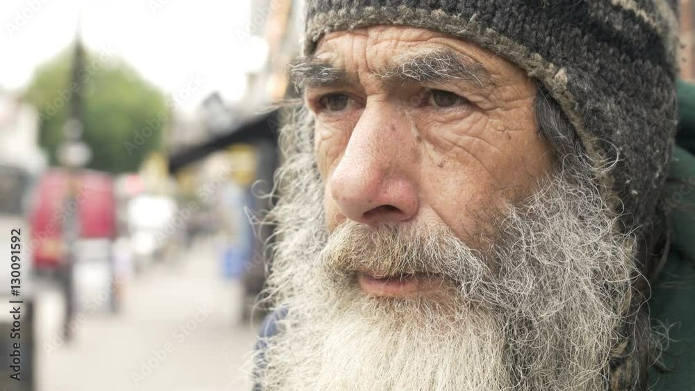 sad old man in the city: homeless looking in the street. poor man sad old man in the city: homeless looking in the street. poor man