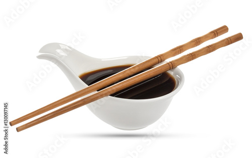 Soy sauce and chopsticks isolated on white background, with clipping path