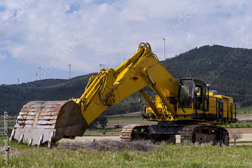 Excavator in a field
