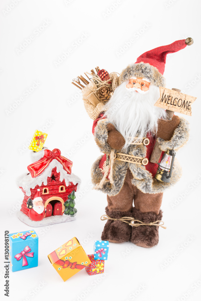 vintage Santa Claus doll, decoration small house and gift boxes