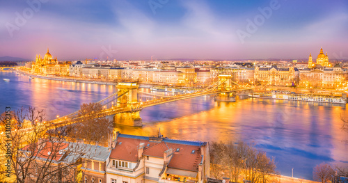 Panoramic view over Szechenyi Chain Bridge, Danube River and Hungarian Parliament, Budapest, Hungary.
