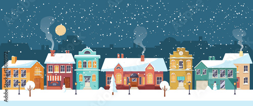 Snowy Christmas night in the cozy town, panorama