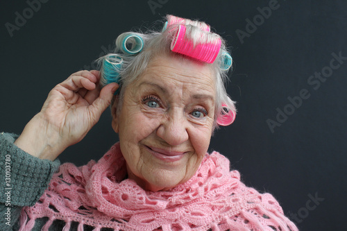 senior woman  in curlers