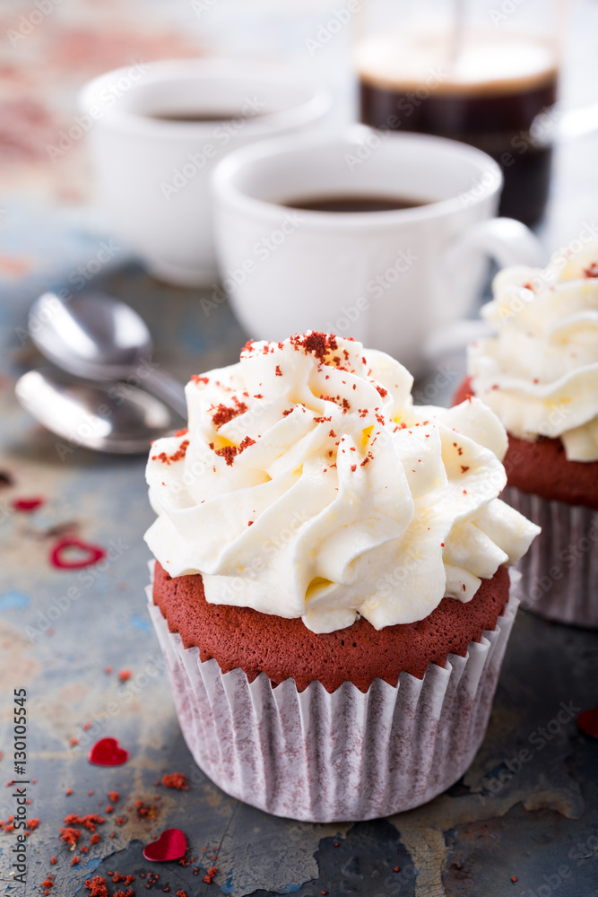 Delicious red velvet cupcakes on rusty old metal background. Valentines Day food. Delicious red velvet cupcakes on rusty old metal background. Valentines Day food.