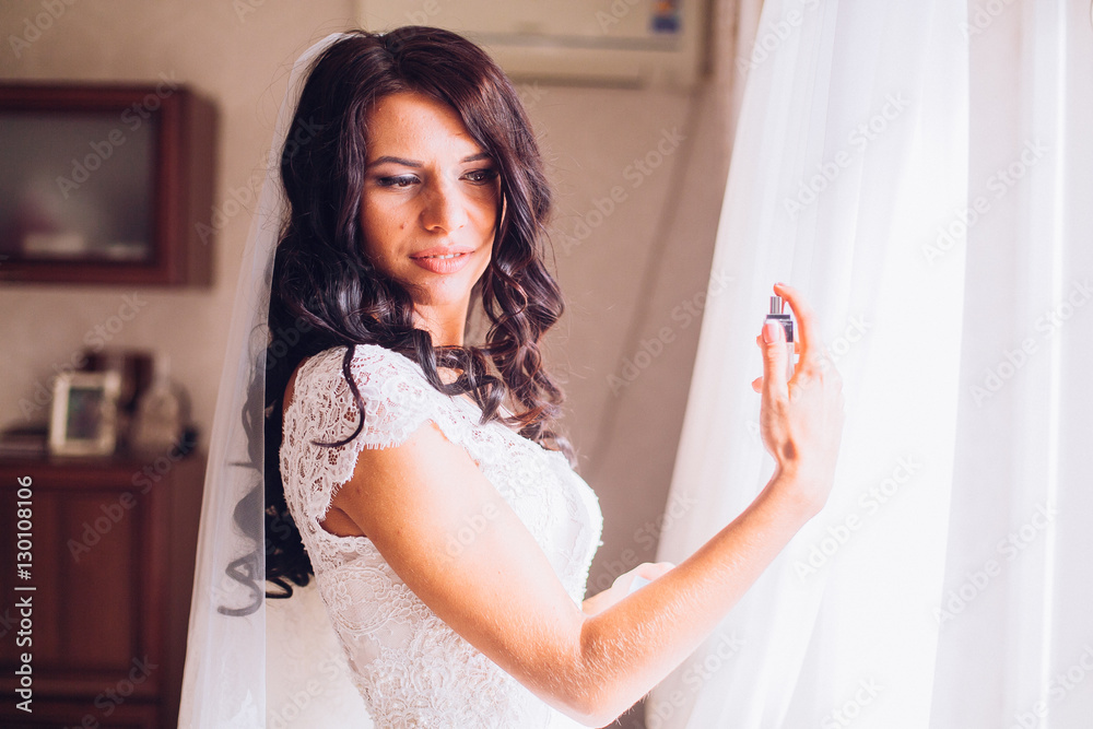 young bride with perfume is getting ready at home in the morning, wedding day young bride with perfume is getting ready at home in the morning, wedding day