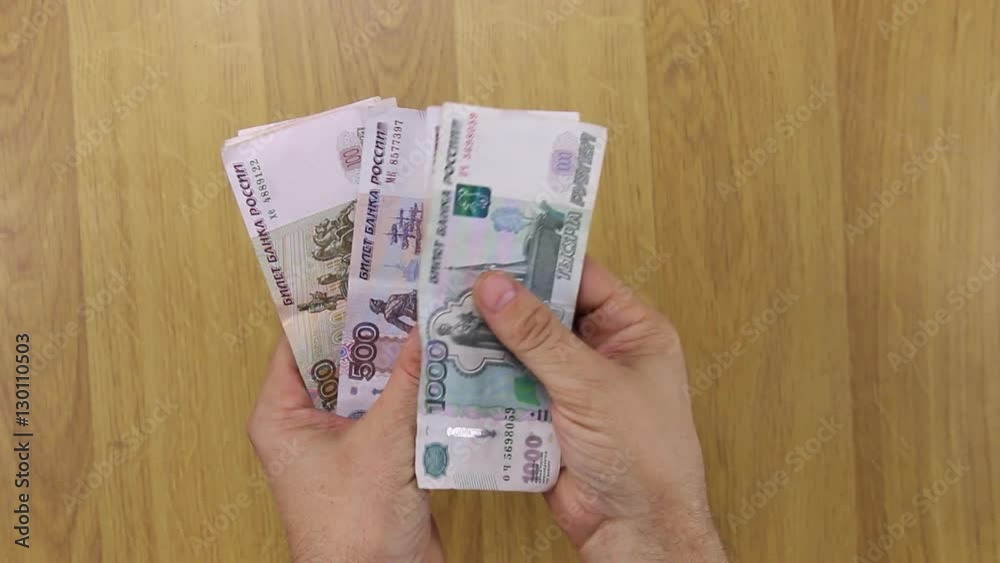 Hands are counted the money, rubles. Hands are counted the money, rubles.