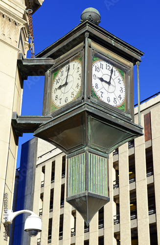 Vintage clock tower on street corner in San Antonio Texas