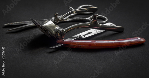 Vintage barber supplies on dark background