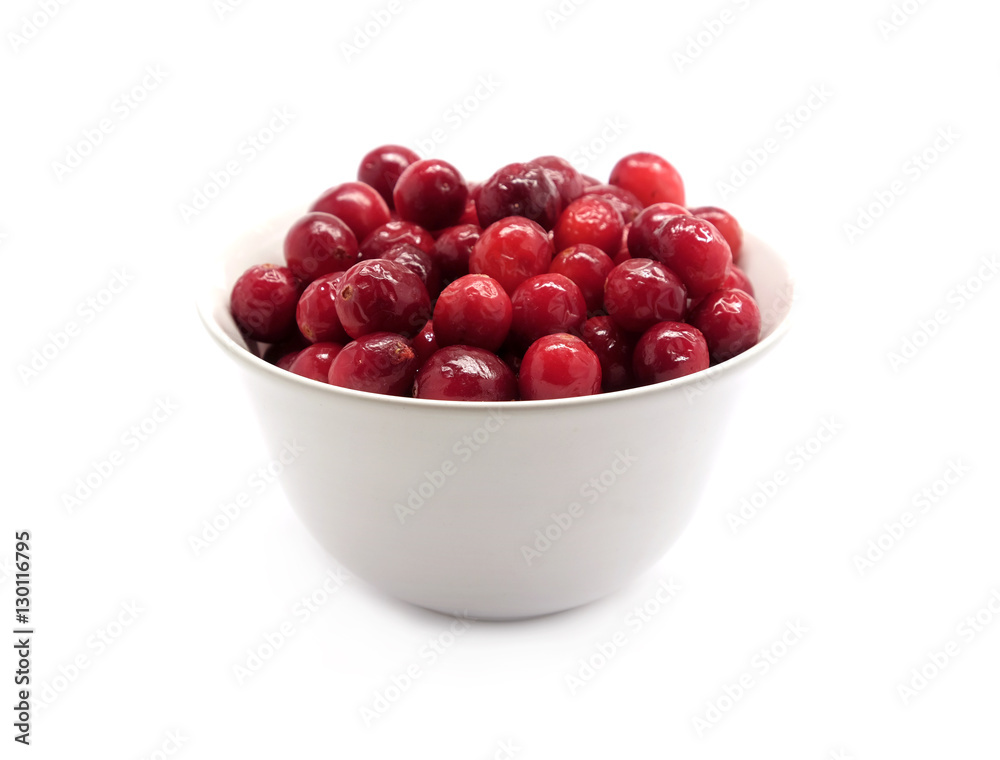 Cranberries in round white bowl isolated on white background indoor front view close up Cranberries in round white bowl isolated on white background indoor front view close up