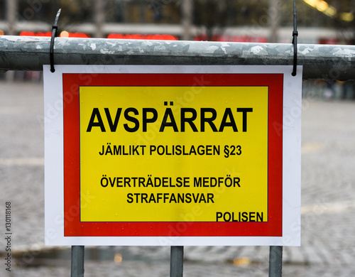 Swedish sign reading: cordoned off, egalitarian Police Act § 23, violation entails criminal liability, police photo