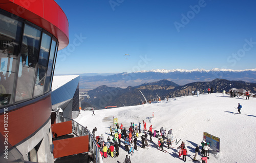 Skiers on the cable car station Chopok photo