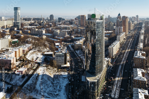 Top view on modern business center Parus, boulevard Lesia Ukrainka and street Mechnikov winter day. Former highest building in Kiev, Ukraine.