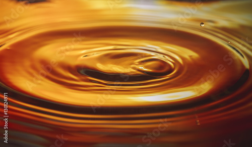 Water ripples on nice orange background