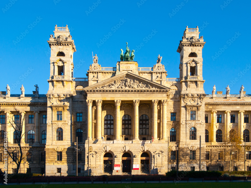 Hungarian National Museum of Ethnography, aka Neprajzi Muzeum, at Kossuth Lajos Square in Budapest, Hungary, Europe. Front view of entrance portal with two towers and architectural columns on sunny Hungarian National Museum of Ethnography, aka Neprajzi Muzeum, at Kossuth Lajos Square in Budapest, Hungary, Europe. Front view of entrance portal with two towers and architectural columns on sunny