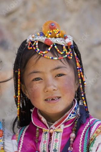Girl of the Naxi minority people, Shangri-La, formerly Zhongdian, Shangri-La region, Yunnan Province, China