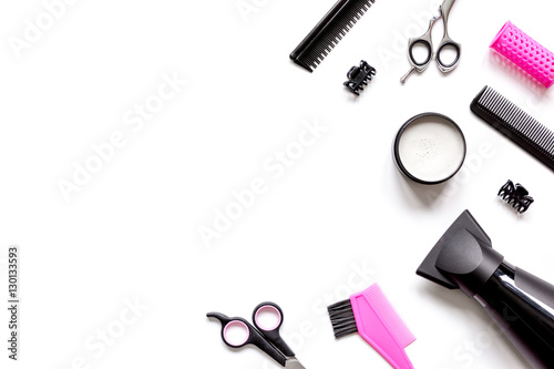 Fototapeta Naklejka Na Ścianę i Meble -  Tools for hair styling on white background top view