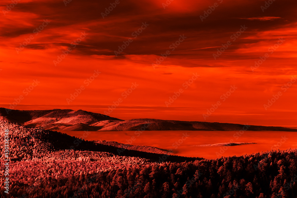 Fantastic aerial infrared view of mountain landscape with sea of