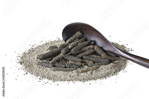 Whole and ground long pepper photo