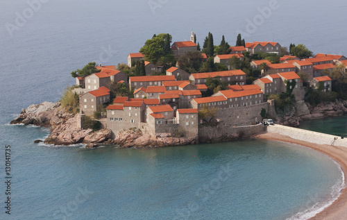 Beach and houses on the hotel island at Sveti Stefan on the Adriatic coast, Sveti Stefan, Montenegro photo