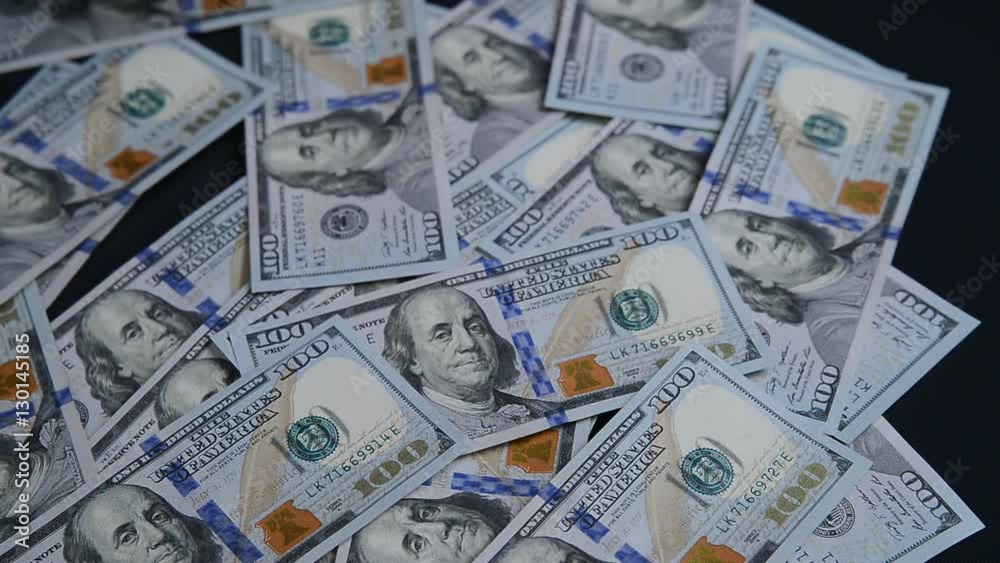 Man throws on the table 100 dollar bills. Man throws on the table 100 dollar bills.