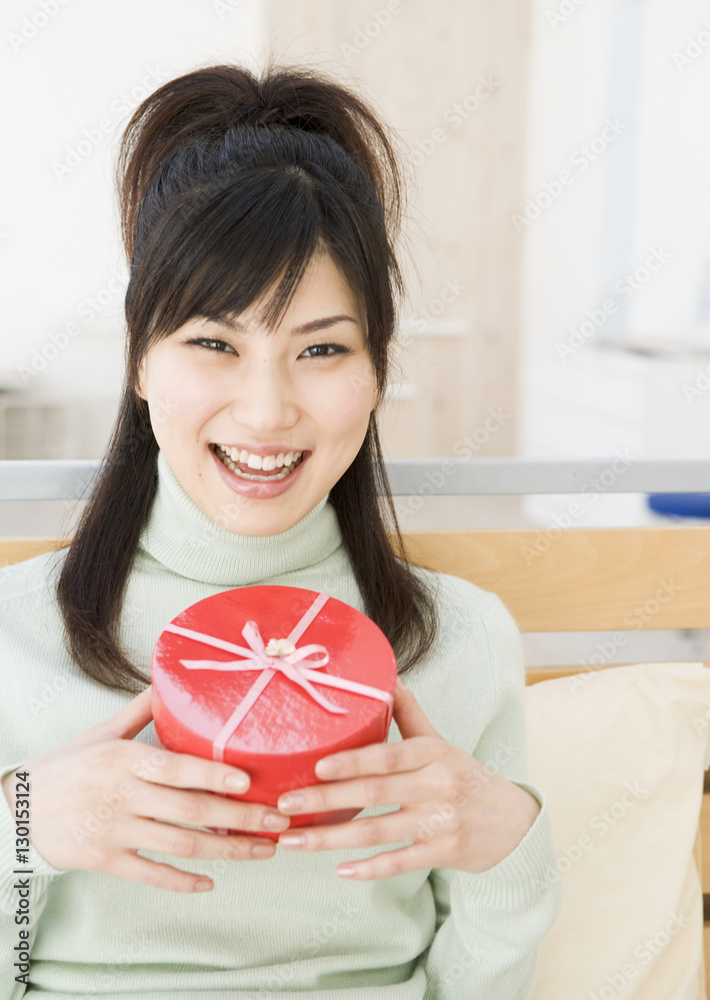 Woman Holding Present