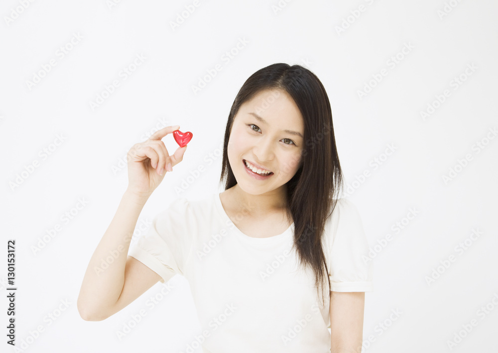 Woman Holding Heart Shaped Candy Woman Holding Heart Shaped Candy