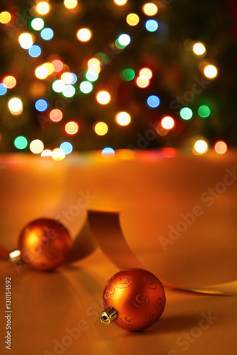 Gold balls with tape on a christmas background
