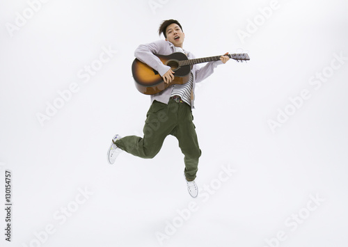 Young man playing the guitar