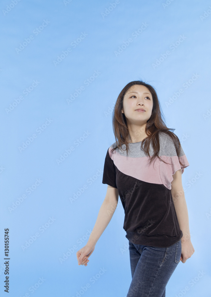 Young woman looking up Young woman looking up