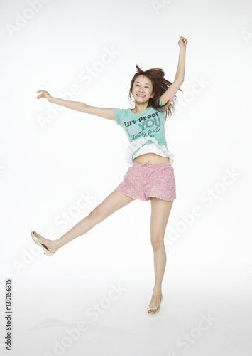 Young woman jumping