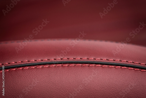 Car leather seat. Horizontal macro photo.