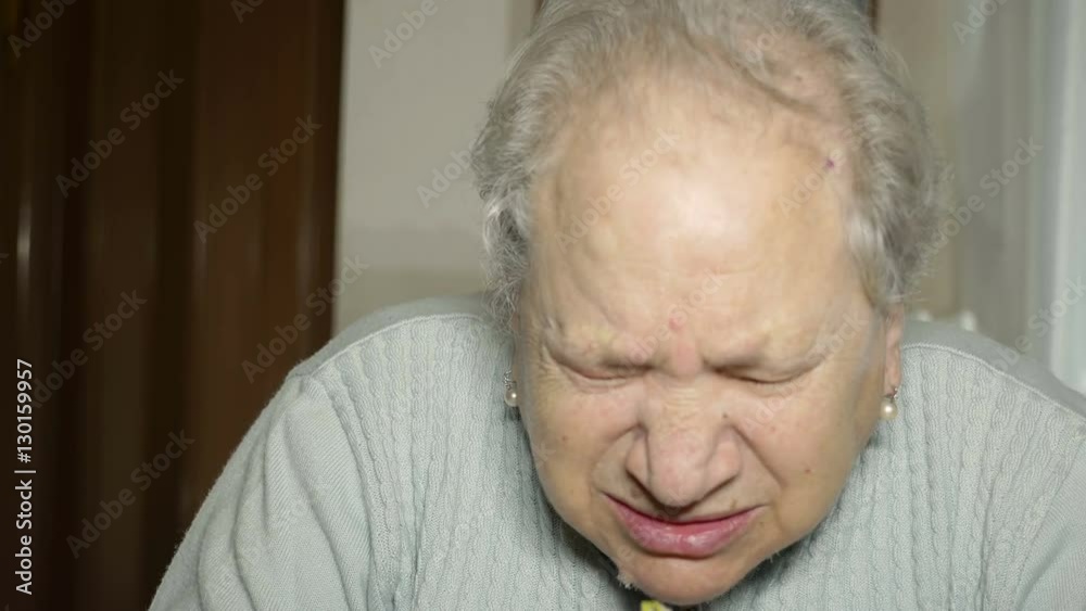 old woman has a cold and snezzes, handkerchief old woman has a cold and snezzes, handkerchief
