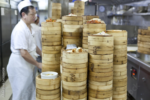 Dim sum preparation in a restaurant kitchen in Hong Kong, China photo
