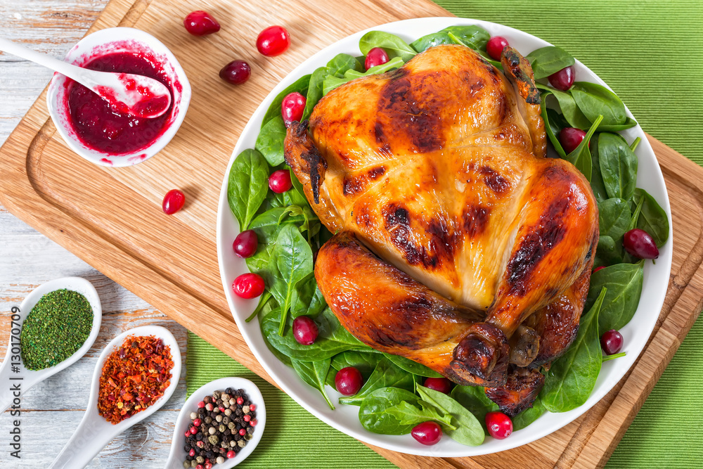 whole grilled chicken served with arugula, spinach and cranberry
