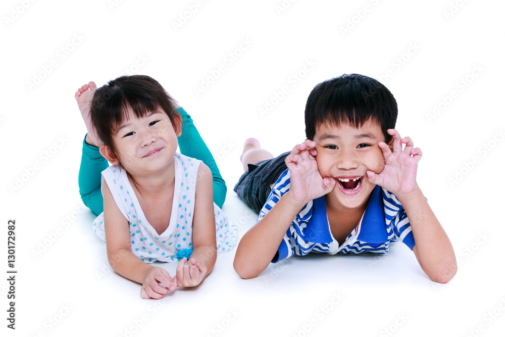 Asian brother and sister having happy together. Studio shot. Asian brother and sister having happy together. Studio shot.