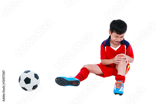 Youth asian soccer player with pain in knee joint. Full body.
