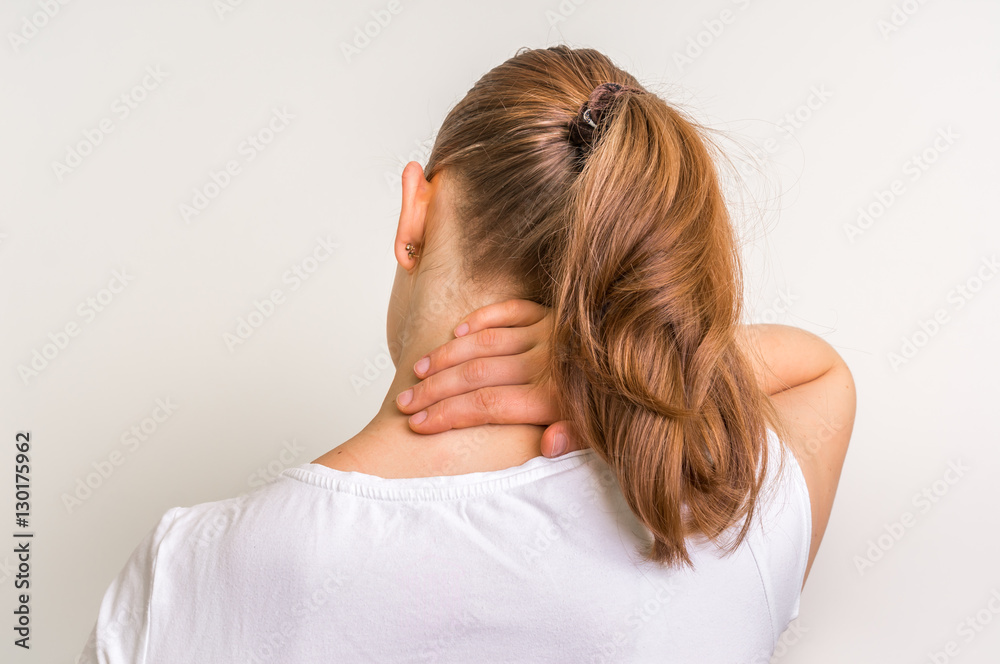Woman with muscle injury having pain in her neck Woman with muscle injury having pain in her neck