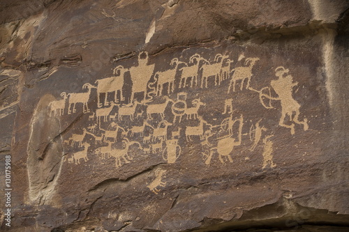 The Great Hunt Panel, Fremont style petroglyphs from AD 700 to AD 1200, Cottonwood Canyon near the junction of Nine Mile Canyon, Utah photo