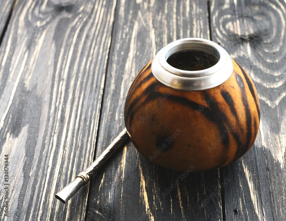 Fototapeta premium Yerba mate tea in a wooden mate calabash