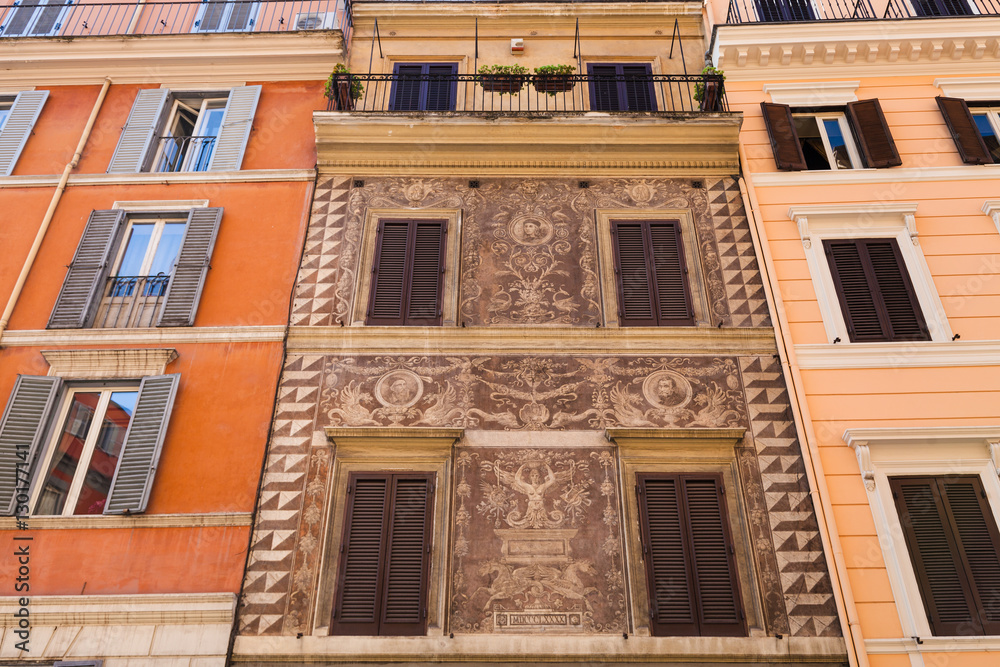 medieval facade of house on street in Rome city