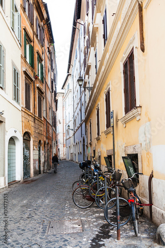 narrow street with bicycles in Rome city © vvoe